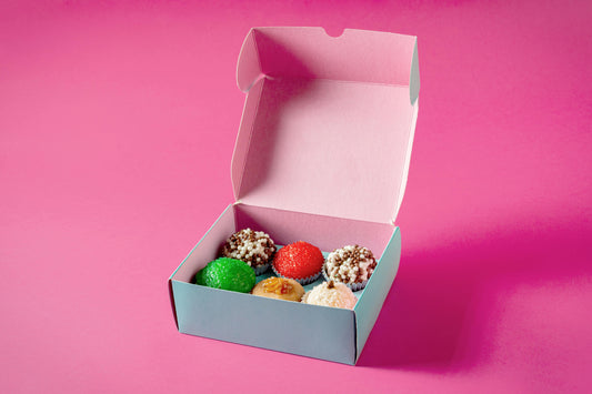  A subscription box being unboxed, showing an assortment of fun items.